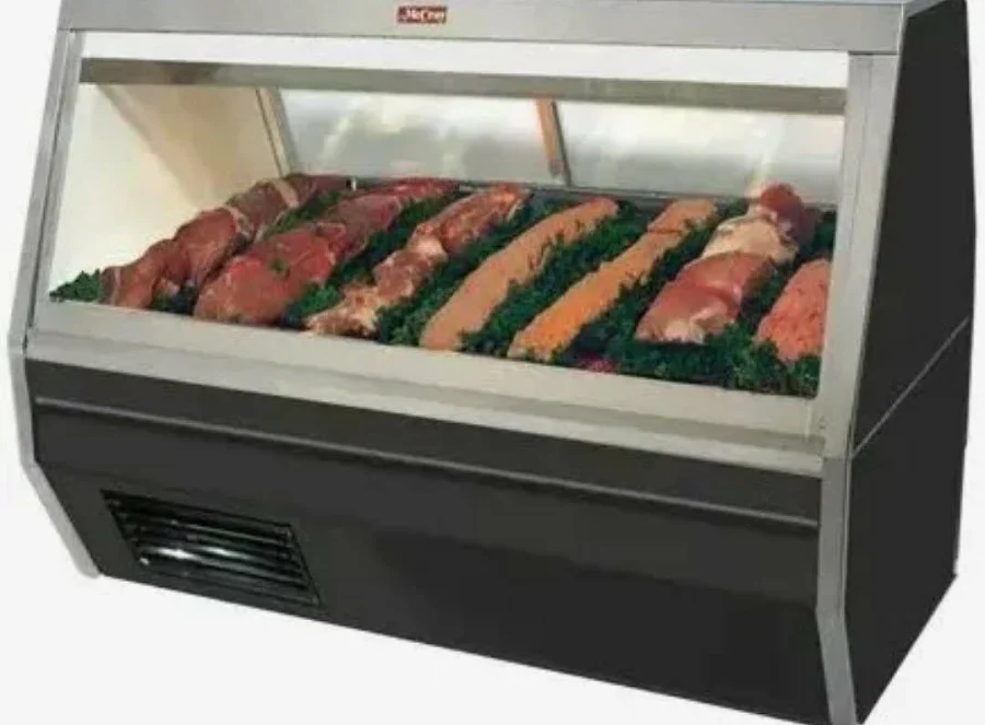 McCray red-meat deli display case stocked with fresh cuts